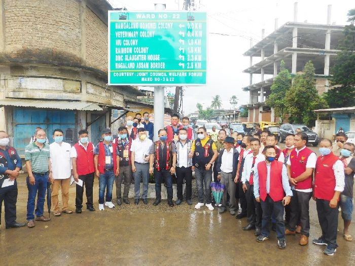 Officials and others during the installation of reflective signboard at Burma Camp junction, Dimapur under the initiative of Joint Council Welfare Forum, Ward No. 3 & 22.